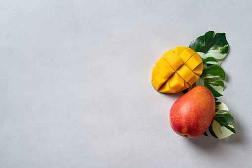 Sliced of mango isolated on white background.