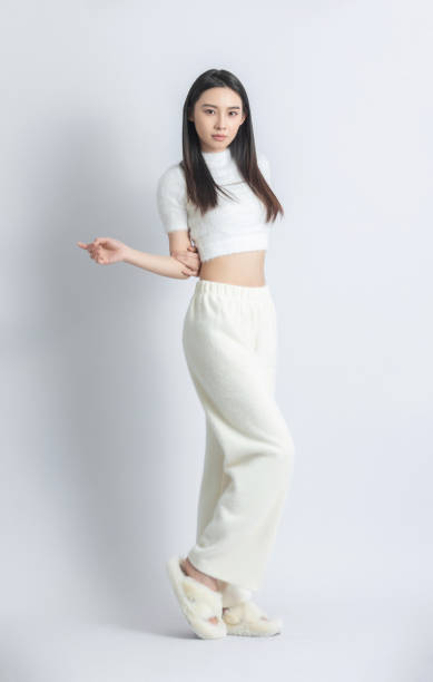 istock Beautiful female model posing in fashion studio 1483221692