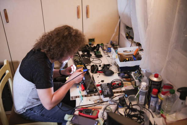 istock Use a soldering iron to solder back between the workpieces needing to be joined 1483221765