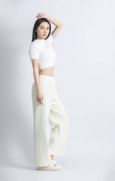istock Beautiful female model posing in fashion studio 1483221958