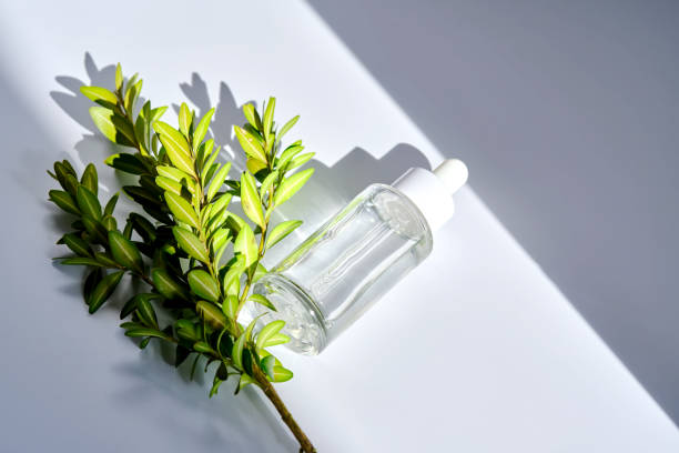 istock Serum with a dropper with spring flowers. 1483224726