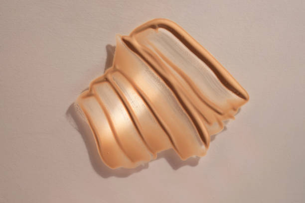 istock Foundation swatch with spf on a beige background. 1483225454