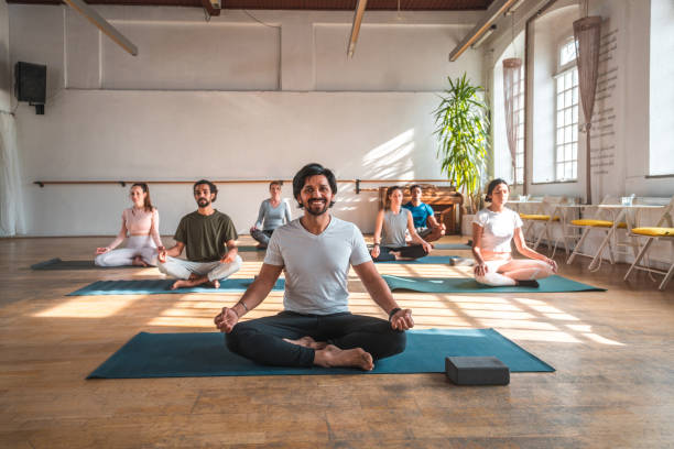 istock Male Indian Meditation Master With Group 1483227679