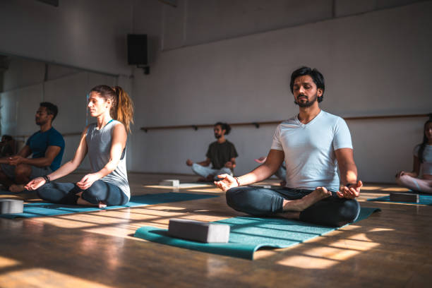 istock Mid Adult  New Agers Meditating at Sunrise 1483228623