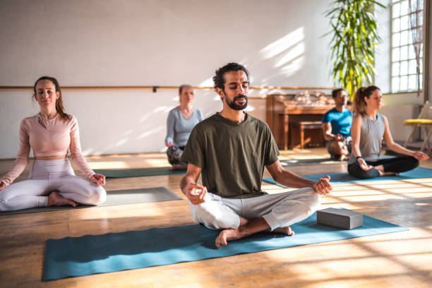 istock Middle Eastern Man and Friends Focusing on Breathing 1483229710