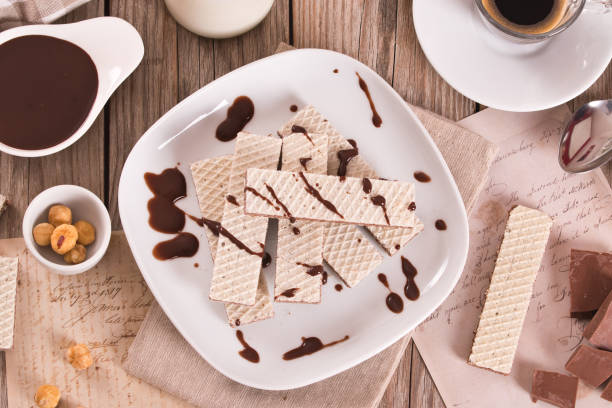 istock Neapolitan wafers filling with hazelnut-chocolate cream. 1483231927