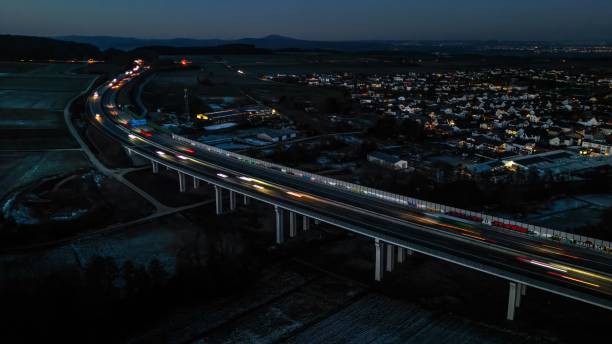 istock high angle view of traffic on highway bridge at night 1483232466