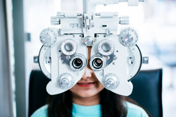 istock Young female having eye exam 1483233225