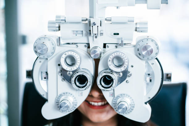 istock Young female having eye exam 1483234022