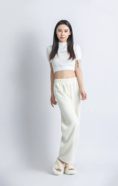 istock Beautiful female model posing in fashion studio 1483234823