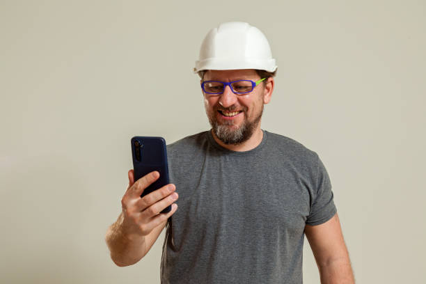 istock The guy shows talking on the phone 1483234950