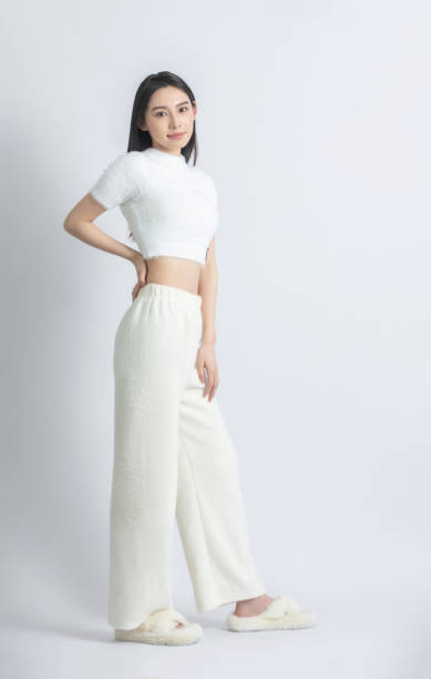 istock Beautiful female model posing in fashion studio 1483235105