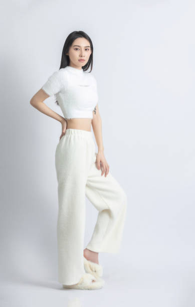 istock Beautiful female model posing in fashion studio 1483235277