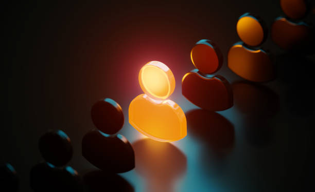 istock Orange Human Symbol Glowing Amid Black Human Symbols On Black Background 1483237049
