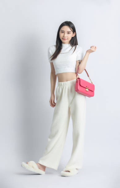 Beautiful female model posing in fashion studio