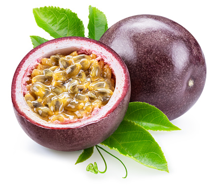 Dark purple passion fruit and it's half with seedly interior on white background. File contains clipping path.