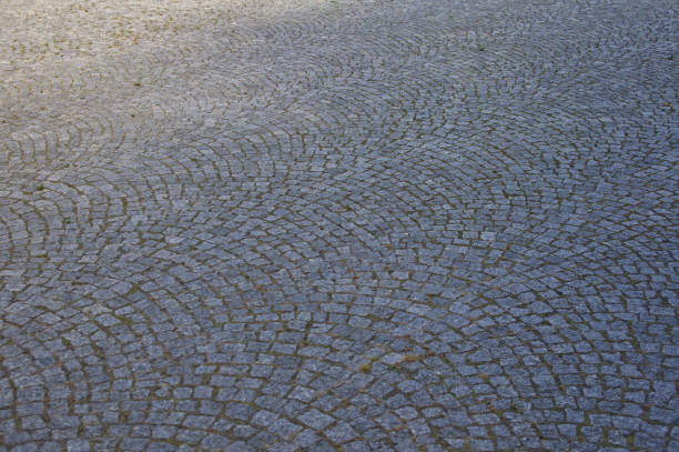istock Pavement made of old stone cobblestones 1483241483