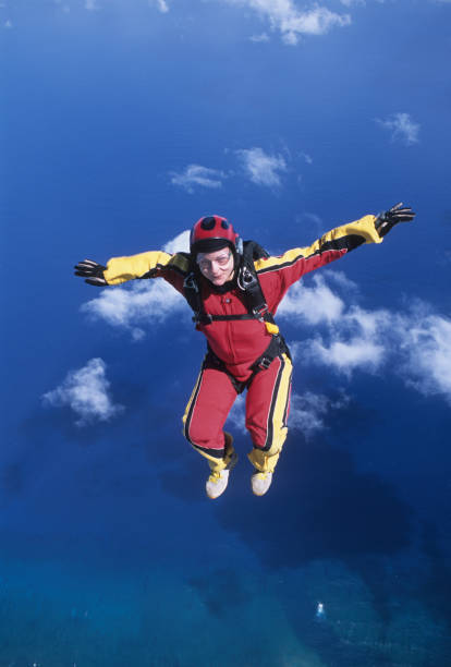 istock Skydiver in free fall above sea 1483241672