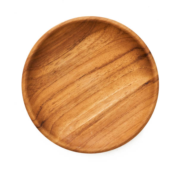istock blank mock up empty wood bowl or dish plate isolated on white background. mock up empty wooden plate isolated 1483242083