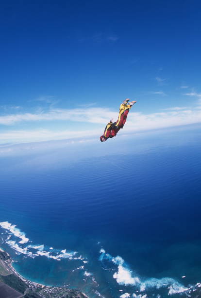 istock Skydiver in free fall above sea 1483242414