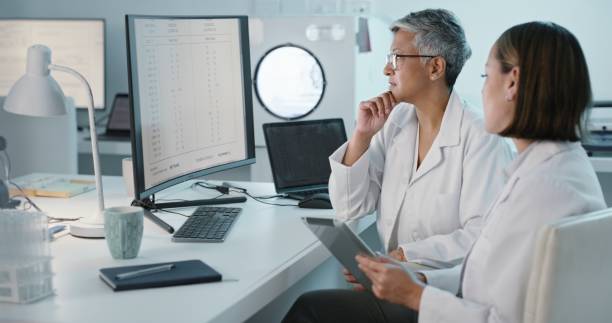 istock Innovation, tablet or computer with a scientist and student in laboratory for research or science. Collaboration, medical and study with a team working together in a lab for discovery or breakthrough 1483243079