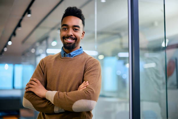 istock Confident black businessman in the office looking at camera. 1483244135