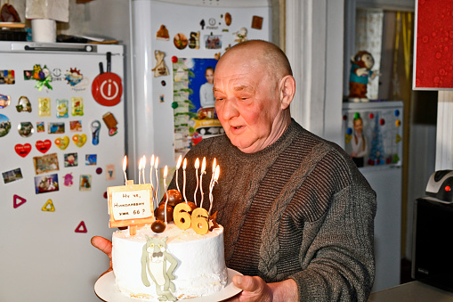 The family celebrates the birthday of a 66-year-old man.