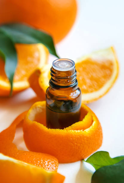 istock Orange essential oil in a small bottle. Selective focus. 1483245506