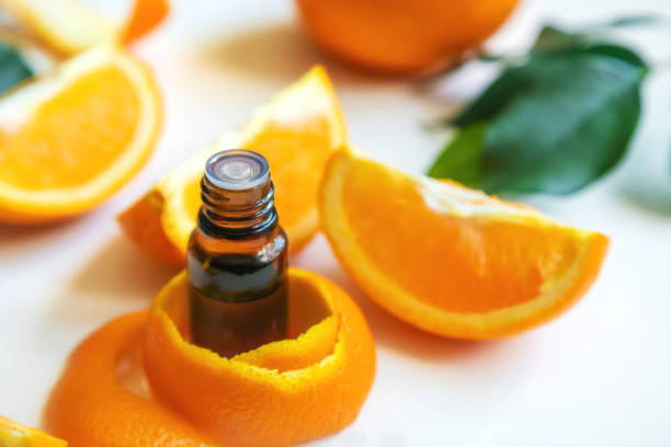 istock Orange essential oil in a small bottle. Selective focus. 1483245509