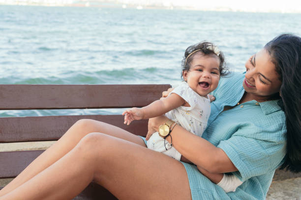istock Latin Mother holds daughter 1483247248