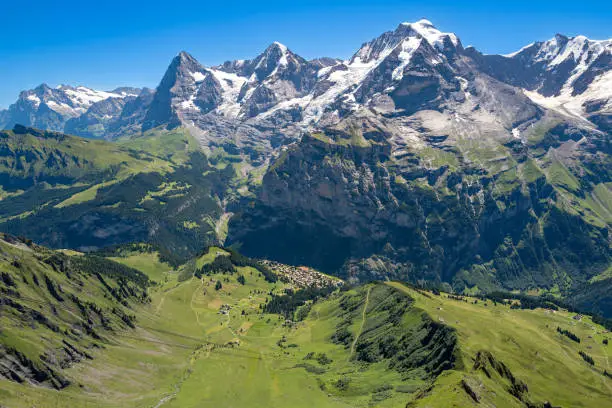Majestic views of the village of Murren, Eiger, Monch, and Jungfrau from the top of Schilthorn, Switzerland.