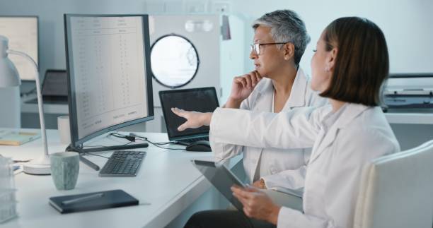 istock Science, tablet or computer with a woman and intern in laboratory for research or innovation. Collaboration, medical and study with a scientist team working in a lab for discovery or breakthrough 1483251781