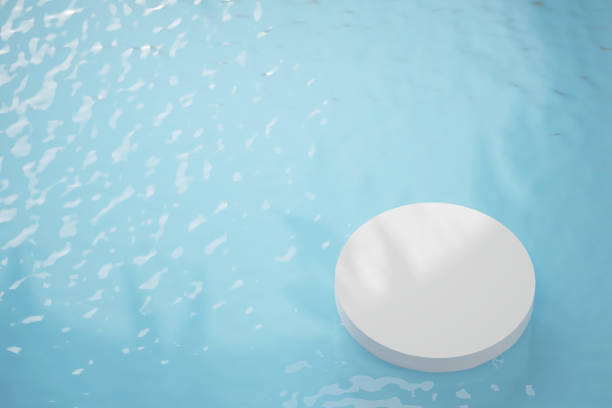 istock 3D white podium or stage for packaging presentation and cosmetic. mock-up product scene with blue water background. 3d rendering minimal style 1483253902
