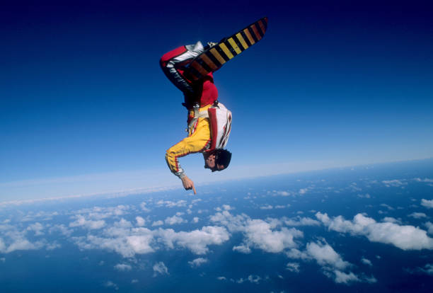 istock Skydiver surfs the air on a skyboard 1483255604