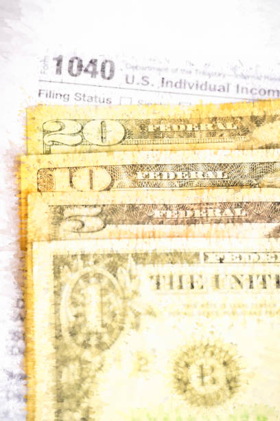 istock IRS form 1040 and dollars still life background 1483256133