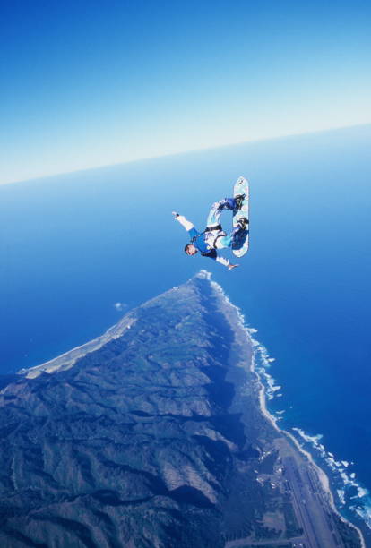 istock Skydiver surfs the air on a skyboard 1483257552