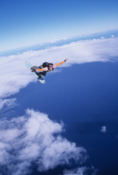 skydiver naviga in aria su uno skyboard - skydiving air aerial view vertical foto e immagini stock