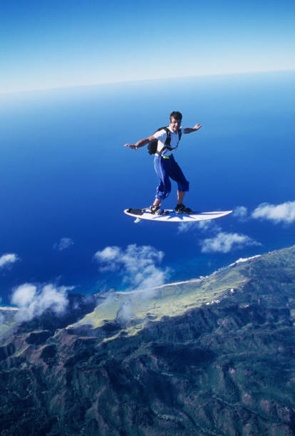 istock Skydiver surfs the air on a skyboard 1483257647