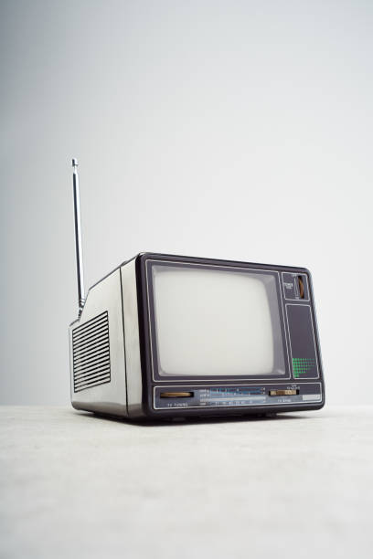 istock Old vintage television on white. Retro portable tv receiver 1483257957