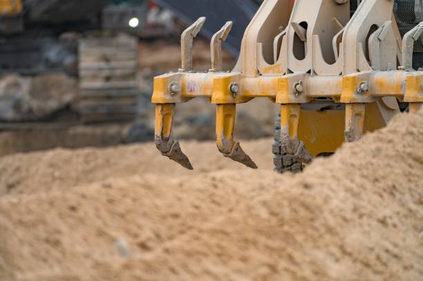 Rear scarifier tines of a grader