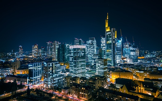 Aerial panoramic view across Frankfurt’s dynamic skyline, from the bridges across the River Main, the historic landmarks of the Old Town to the futuristic spires of the banking skyscrapers and the shops of Zeil and Hauptwache, Hesse, Germany.
