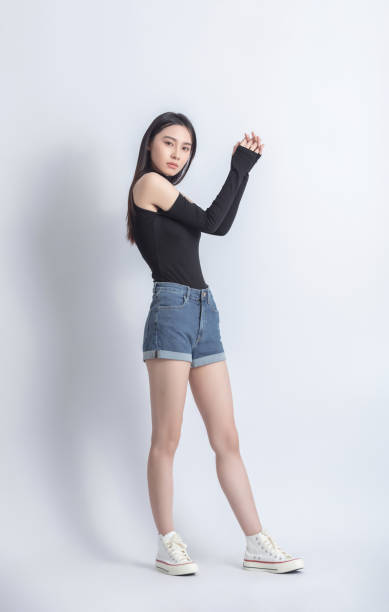 Beautiful female model posing in fashion studio