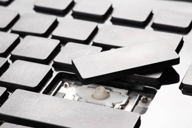 istock A broken old laptop keyboard close up 1483277473