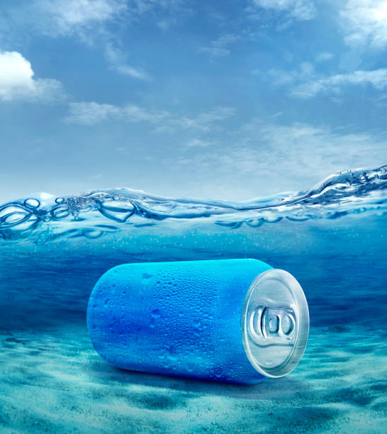 Aluminum can with water droplets under sea ocean