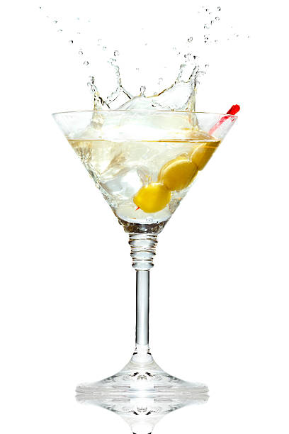 istock Olive splashing on martini glass isolated 148327932
