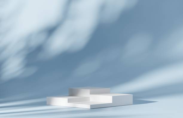 istock 3D white podium or white dais stage. blue mock-up stand product scene blue background. 3d podium stage illustration render. 1483280480