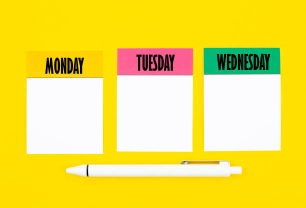 istock The Blank Monday, Tuesday and Wednesday paper note and pen for text or message on yellow background. 1483282664