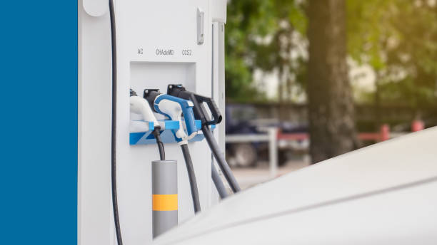 istock Pump plug-in charging cable, electric vehicle, EV, vehicle with modern technology, UI control, information display, filling station, car plug-in, sustainable alternative, eco-energy. 1483283327
