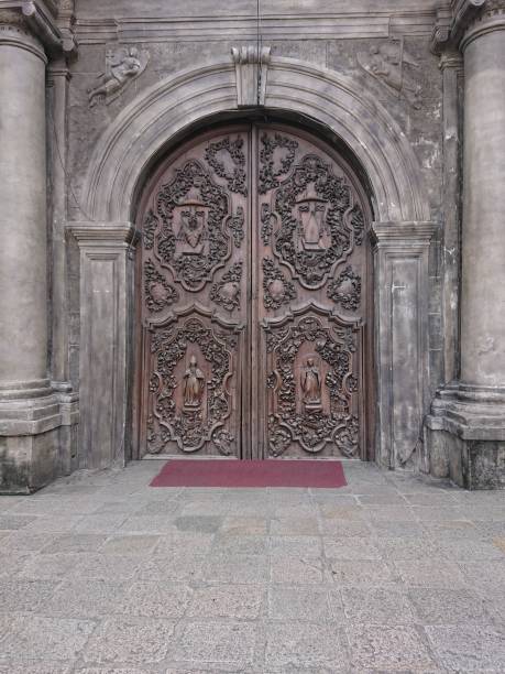 istock two large ornate wooden doors to a building with columns and pillars 1483286664
