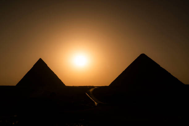 istock View of the Egyptian  Pyramids complex in silhouette at sunset, Egypt 1483287468